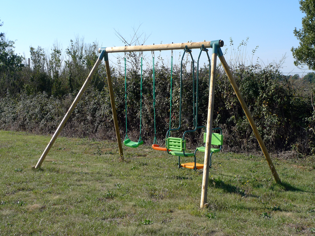 Swings in the Garden at Les Ammonites Holiday Home