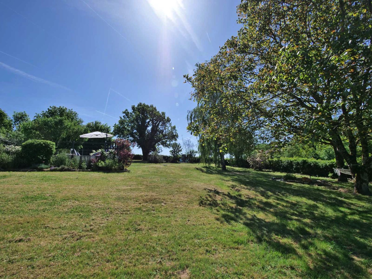 Relax in the garden at Chez Le Pinier Gite