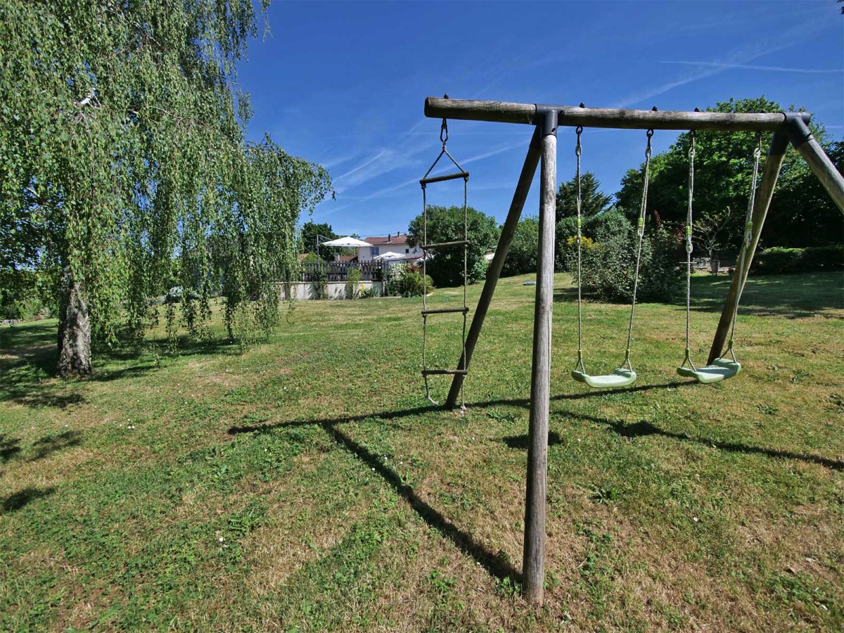 Swings in the garden at Chez Le Pinier Gite