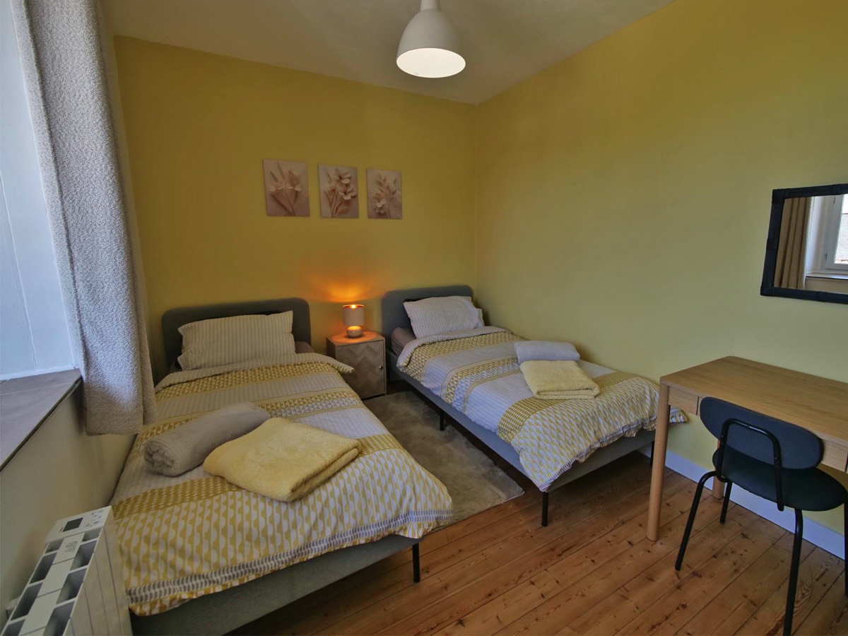Twin bedroom at Chez Le Pinier Gîte