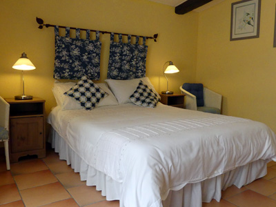 Relax in the double bedroom at Le Cottage Bleu