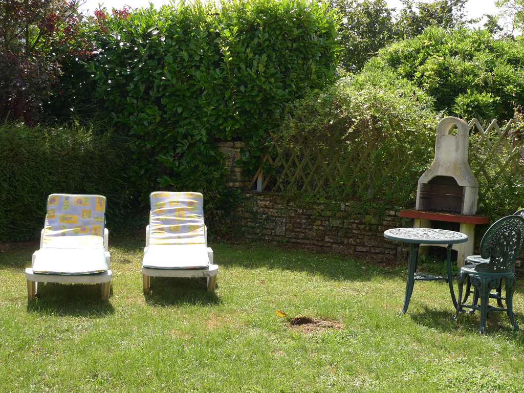 Relax in the garden at Le Gite Tranquille