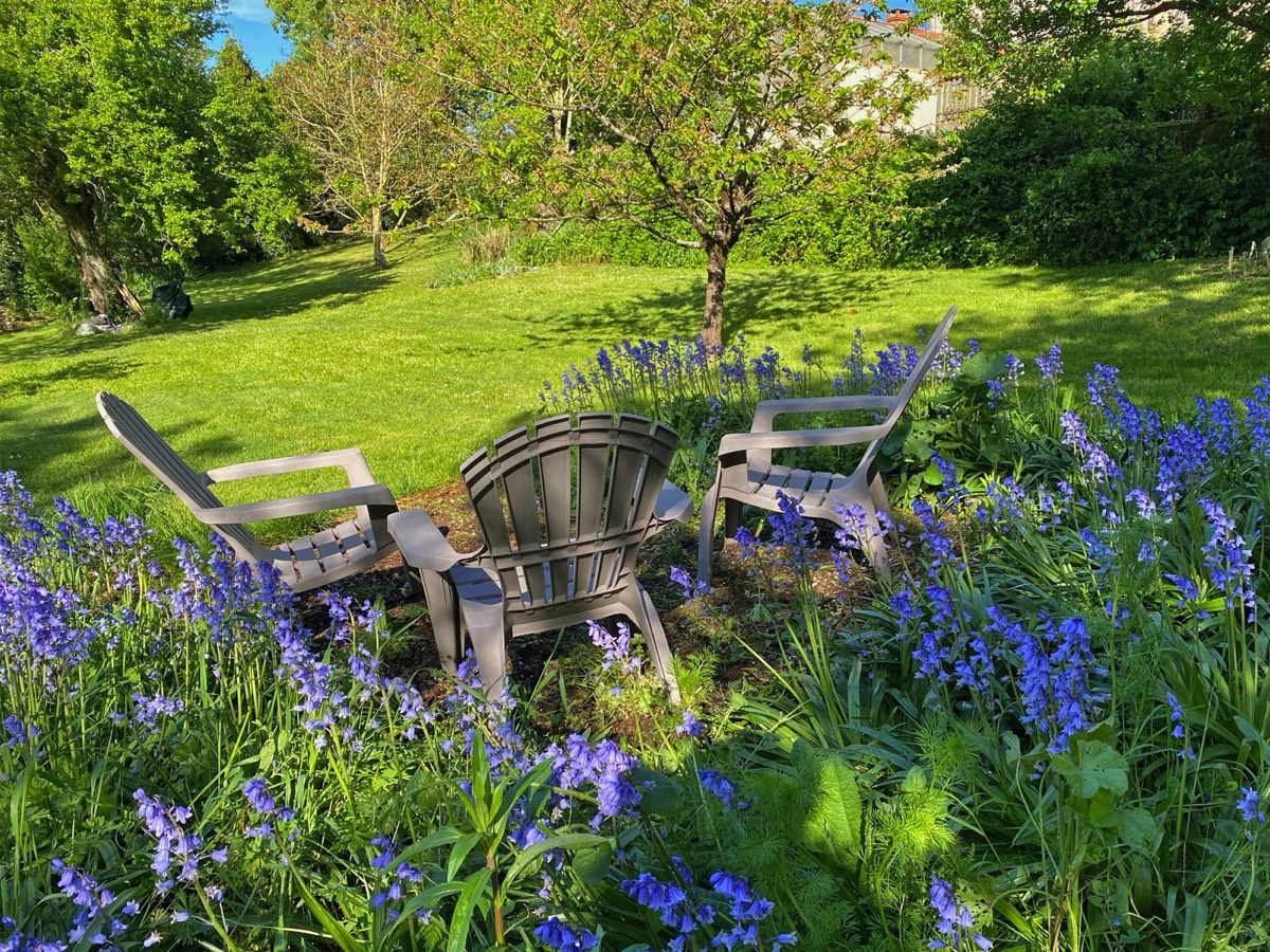 Relax in the garden at Le Vieux Cafe