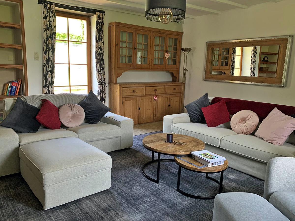 Relax in the cosy lounge at Maison Meli Holiday Cottage